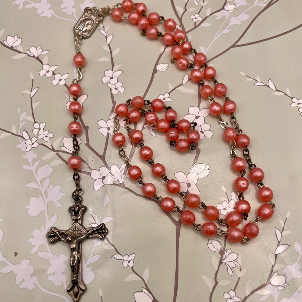 Vintage Pink Rosary w/a Crucifix Necklace. Has the word Fatima on the back.